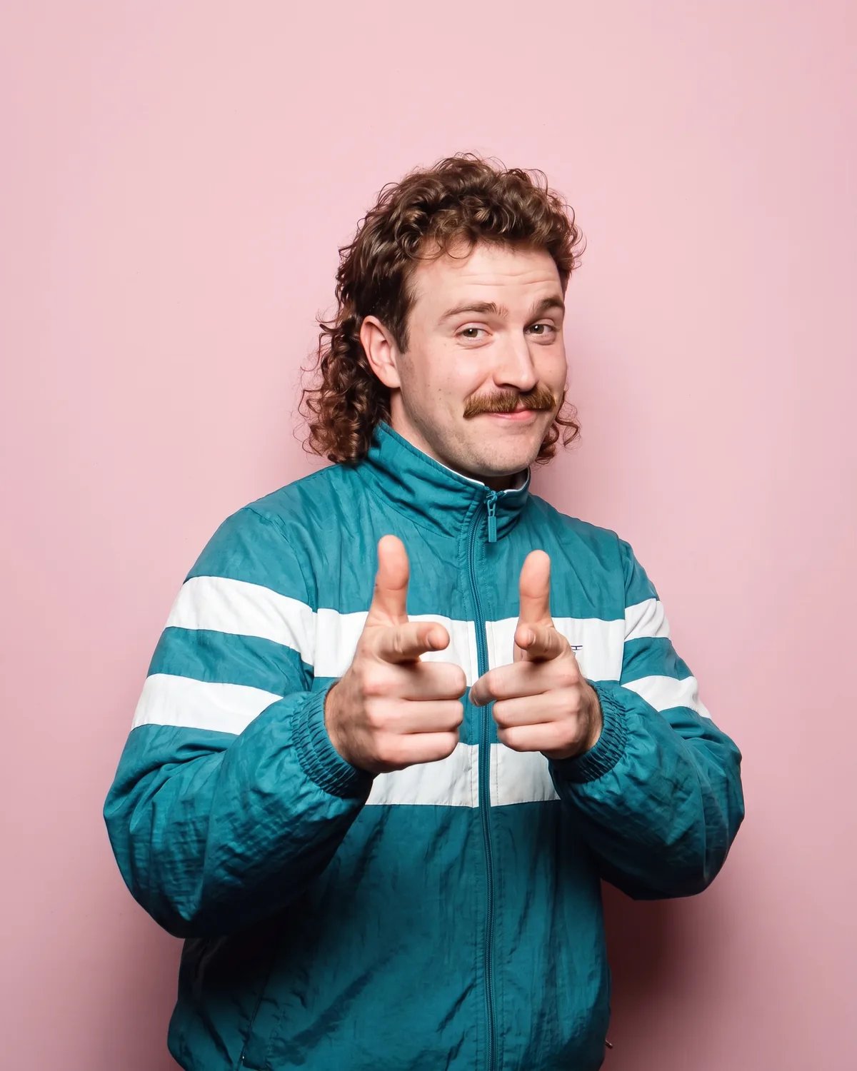 Guest at a brand pop-up pointing at the camera