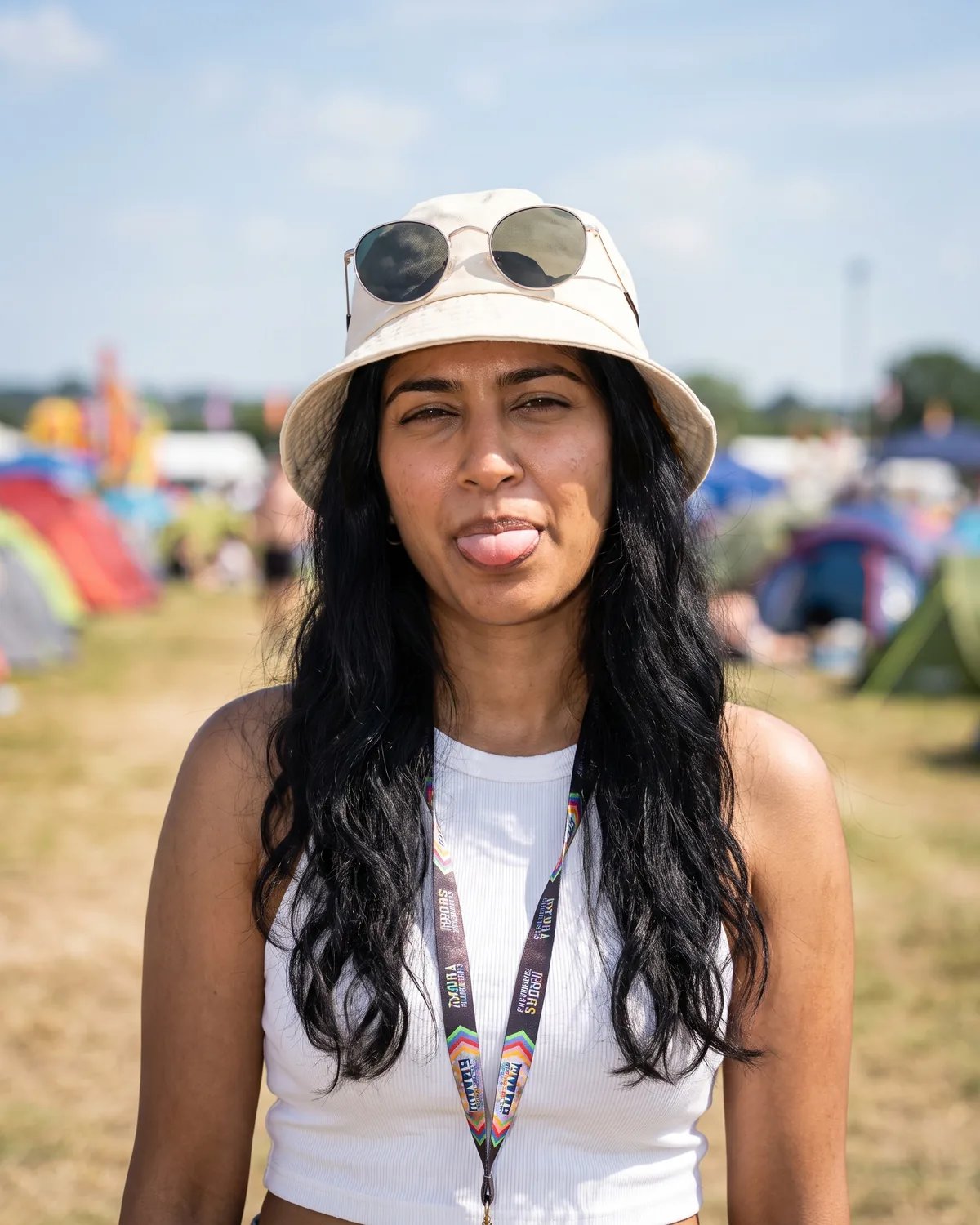 Guest in a bucket hat at a summer music festival