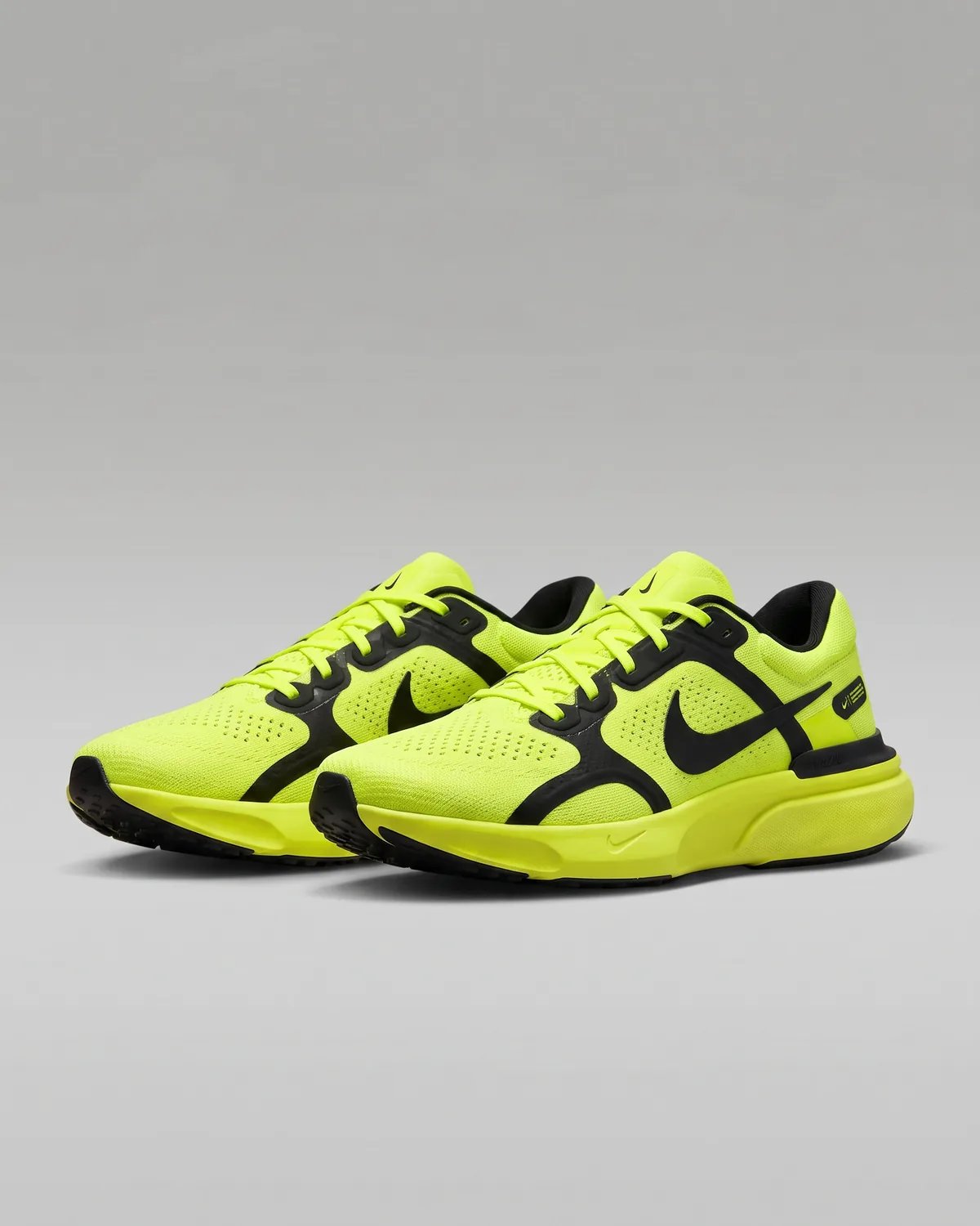 Nike running shoes in volt yellow and black