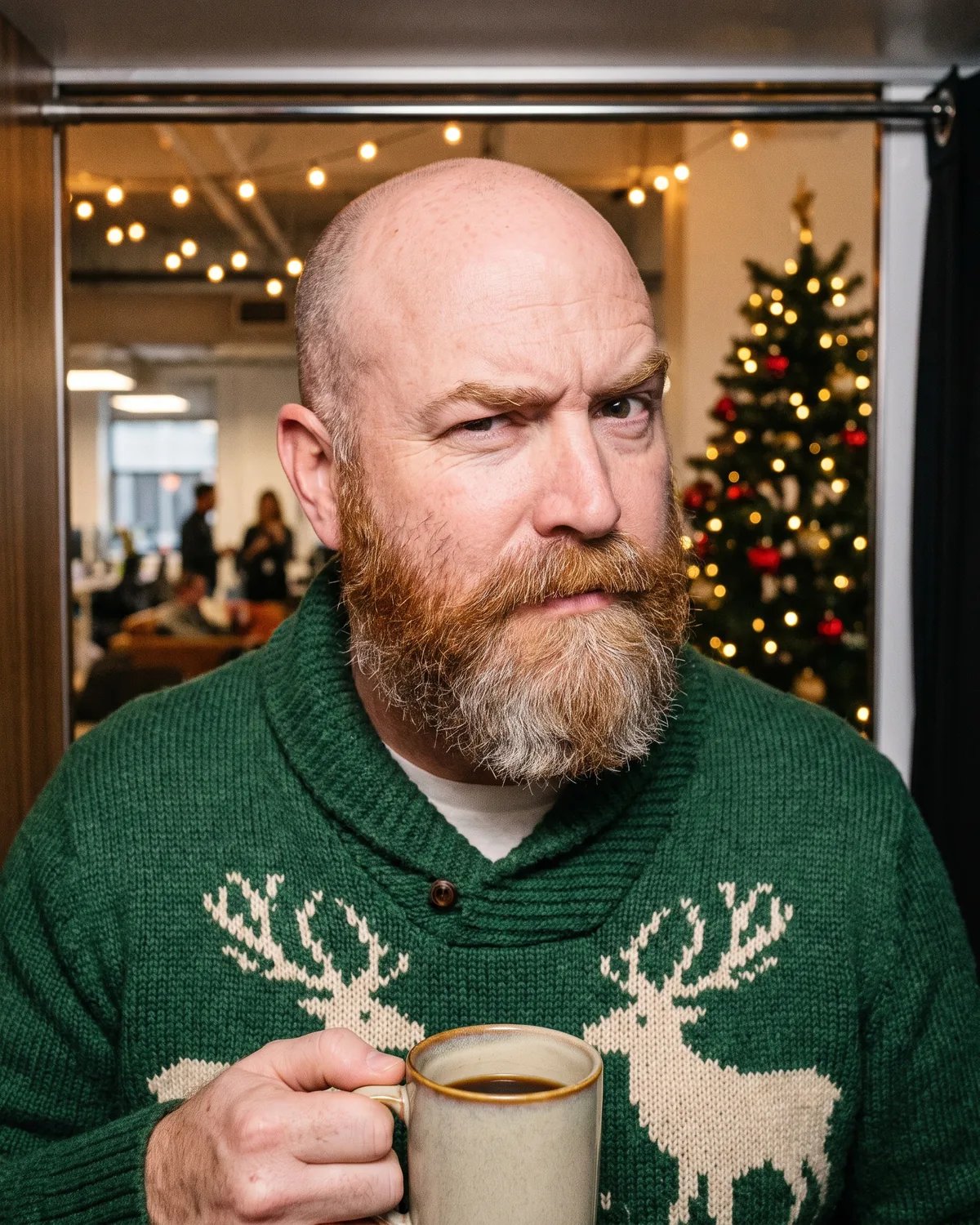 Guest at a company holiday party in a reindeer sweater, one eyebrow raised over his coffee