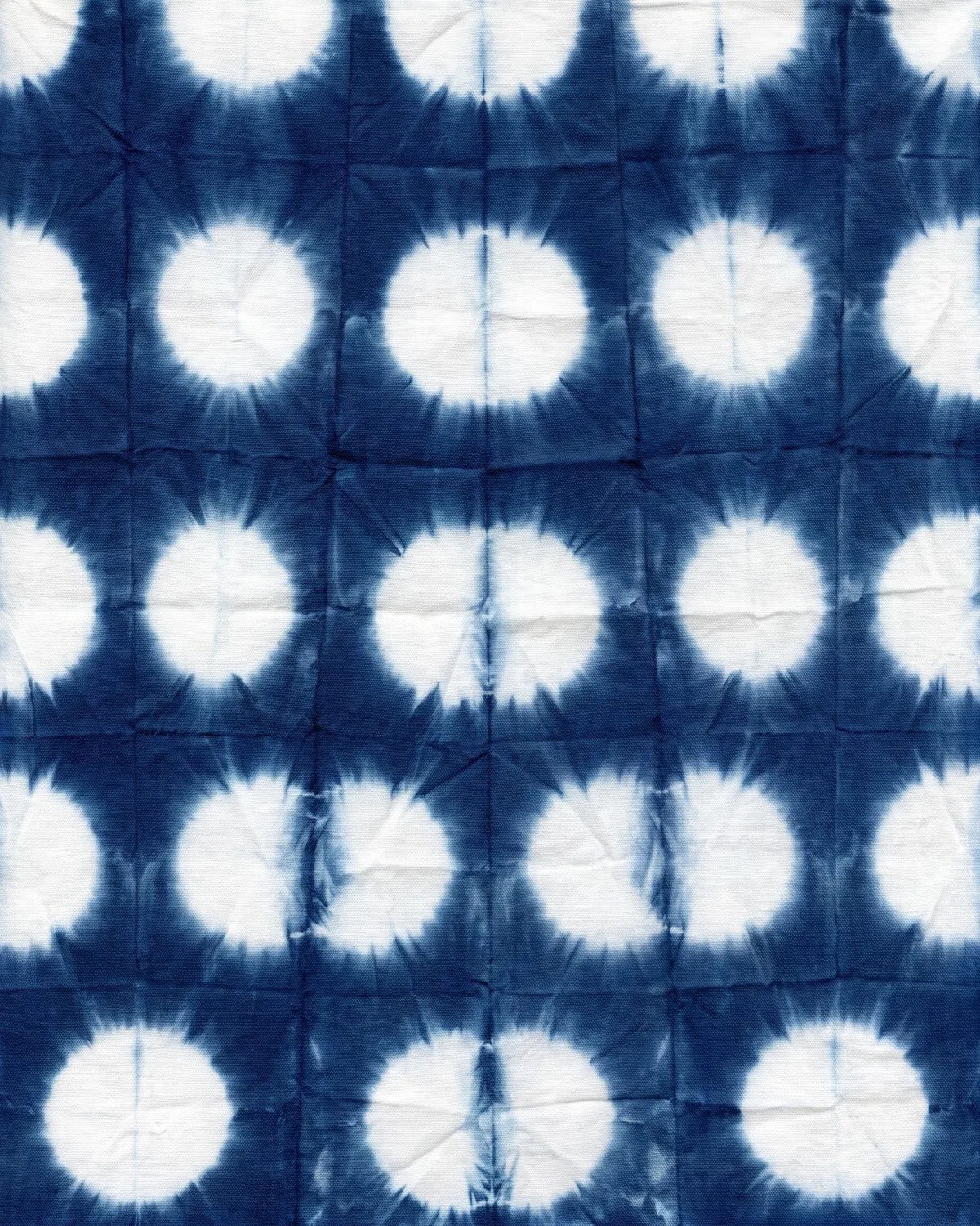 Indigo shibori tie-dye with white circles