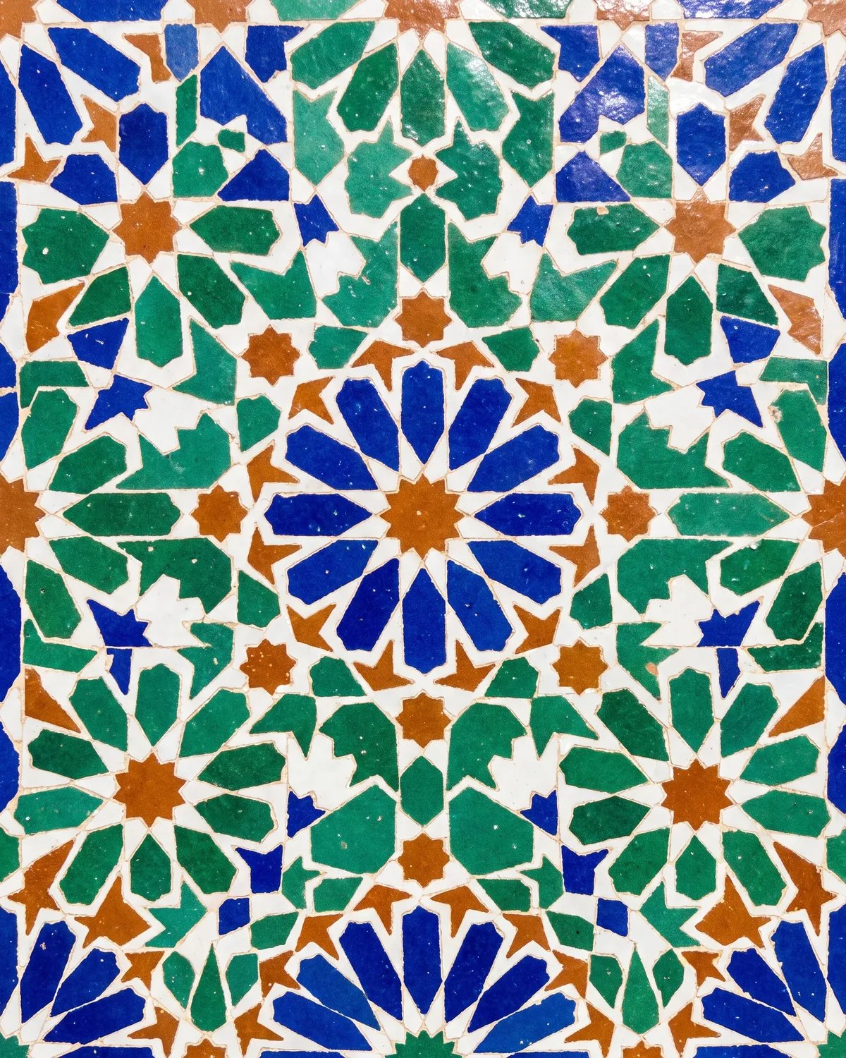 Moroccan zellige tile in cobalt, emerald and terracotta