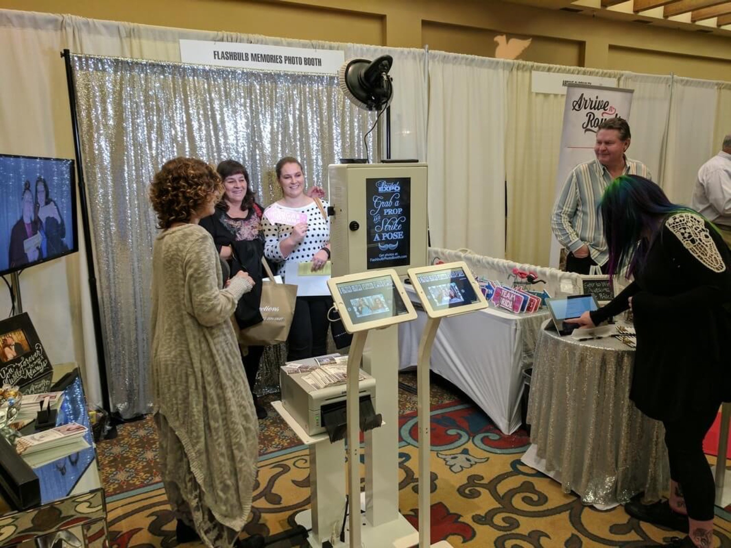 Brides and wedding planners at the Flashbulb Memories booth during the Tucson Bridal Expo at the Hilton El Conquistador Resort, January 2017