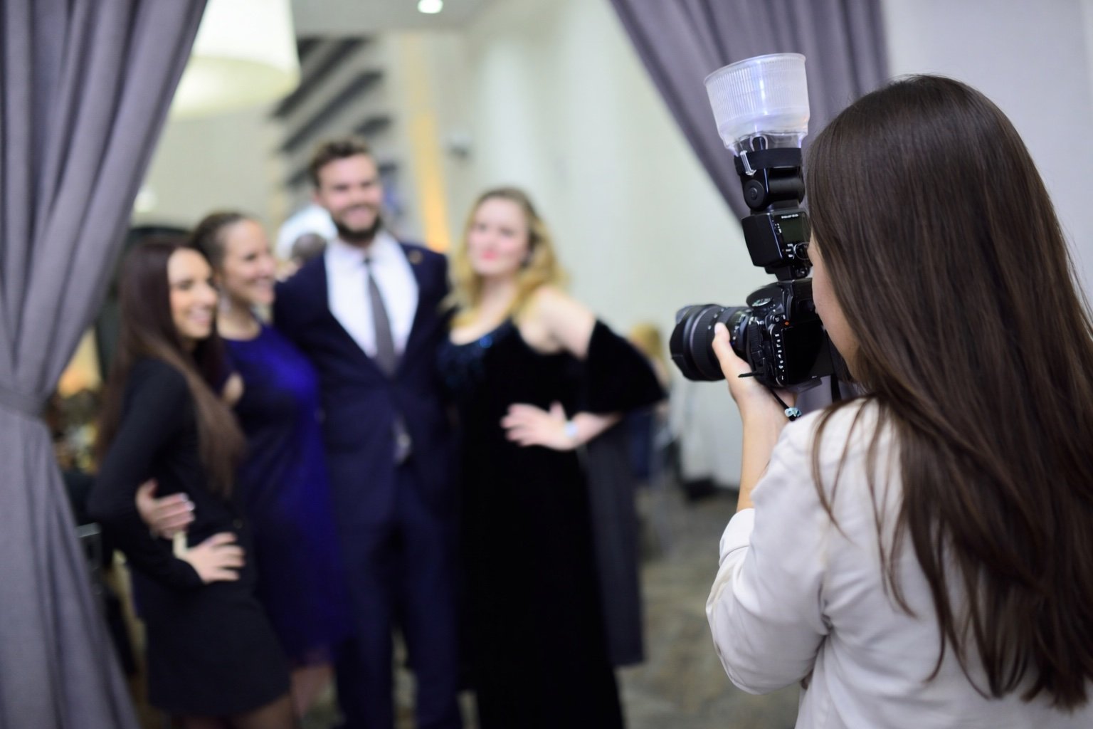 Professional photographer with DSLR roaming setup