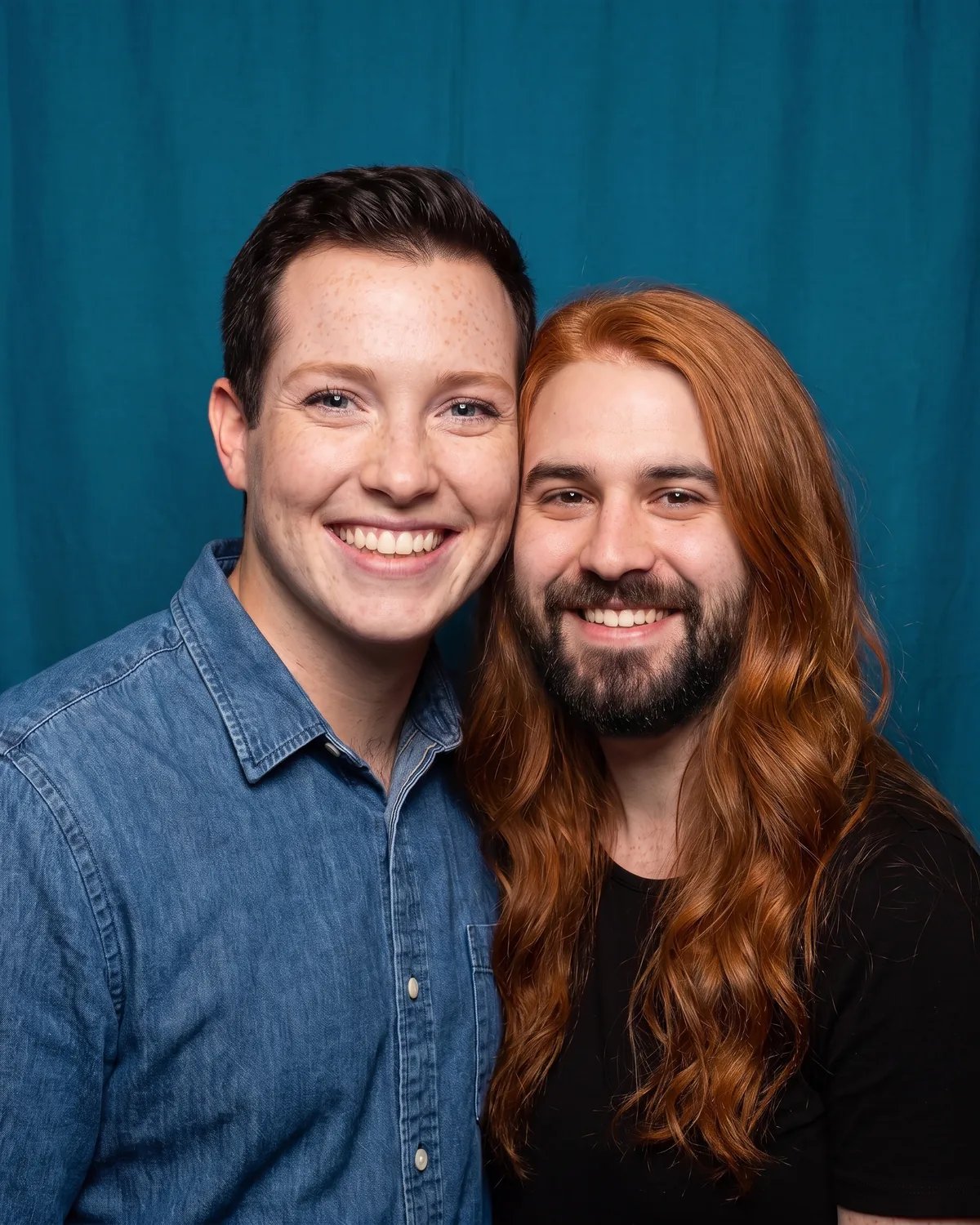 The same photo with their faces traded, his beard on her and her freckles on him