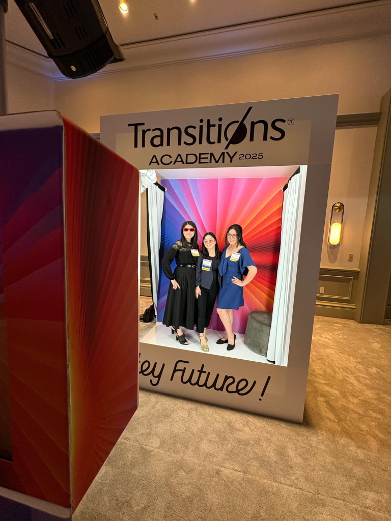 Branded magazine-style photo activation with guests inside a step-and-repeat set