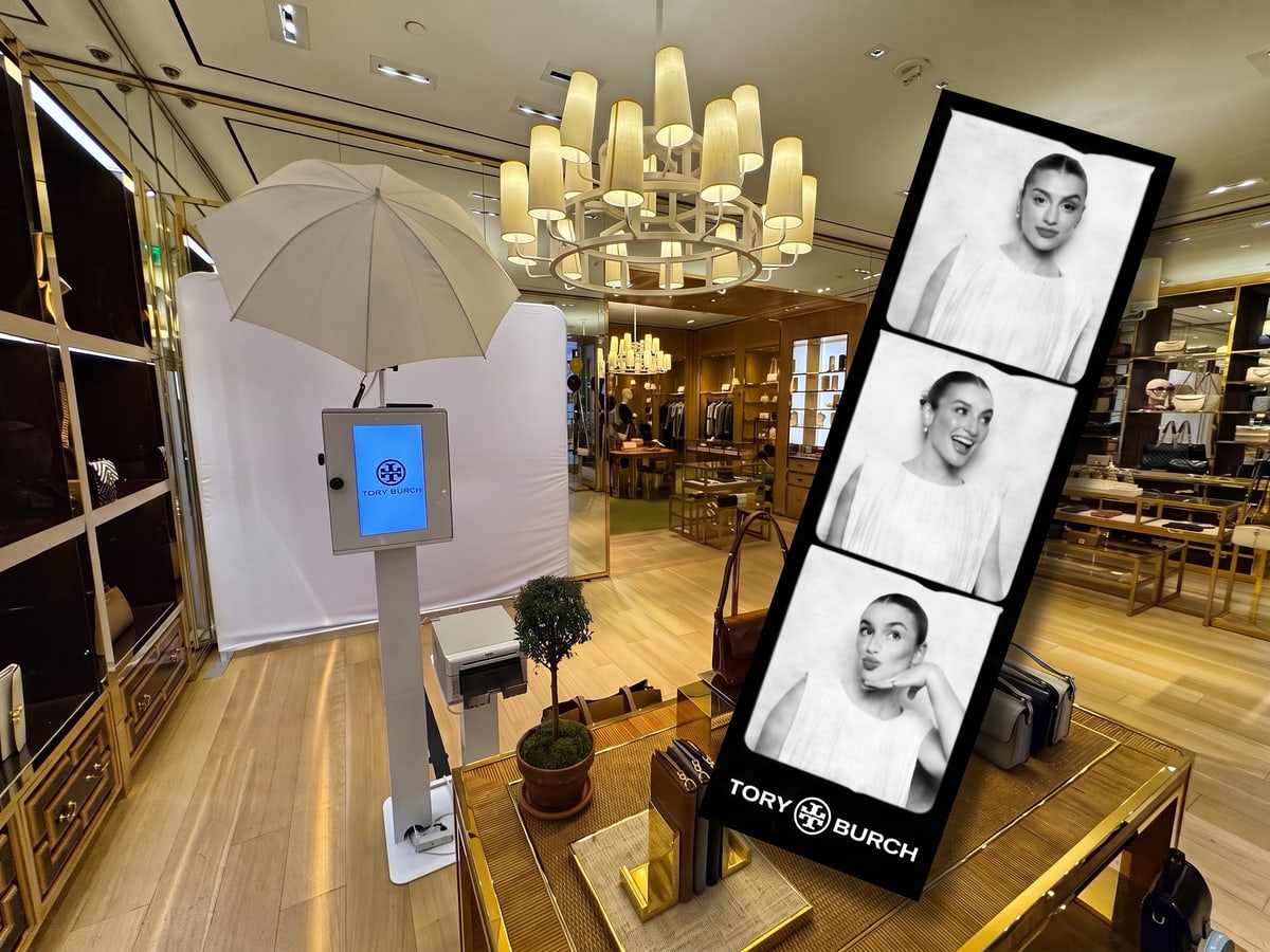 Modern photo booth setup with vintage output